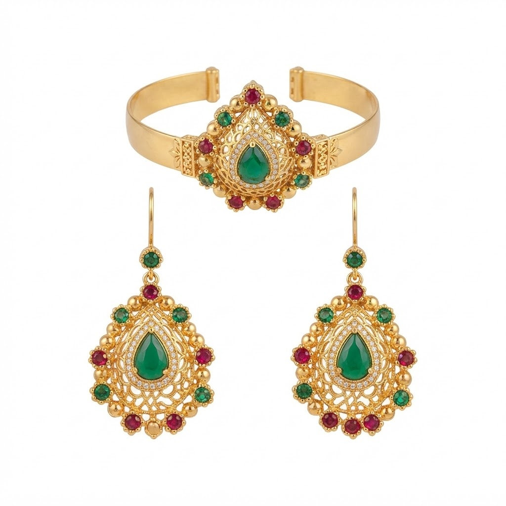 Parure Héritage Émeraude — Bracelet manchette en filigrane d’or orné et boucles d’oreilles pendantes assorties, agrémentés d’émeraudes centrales et de touches de rubis